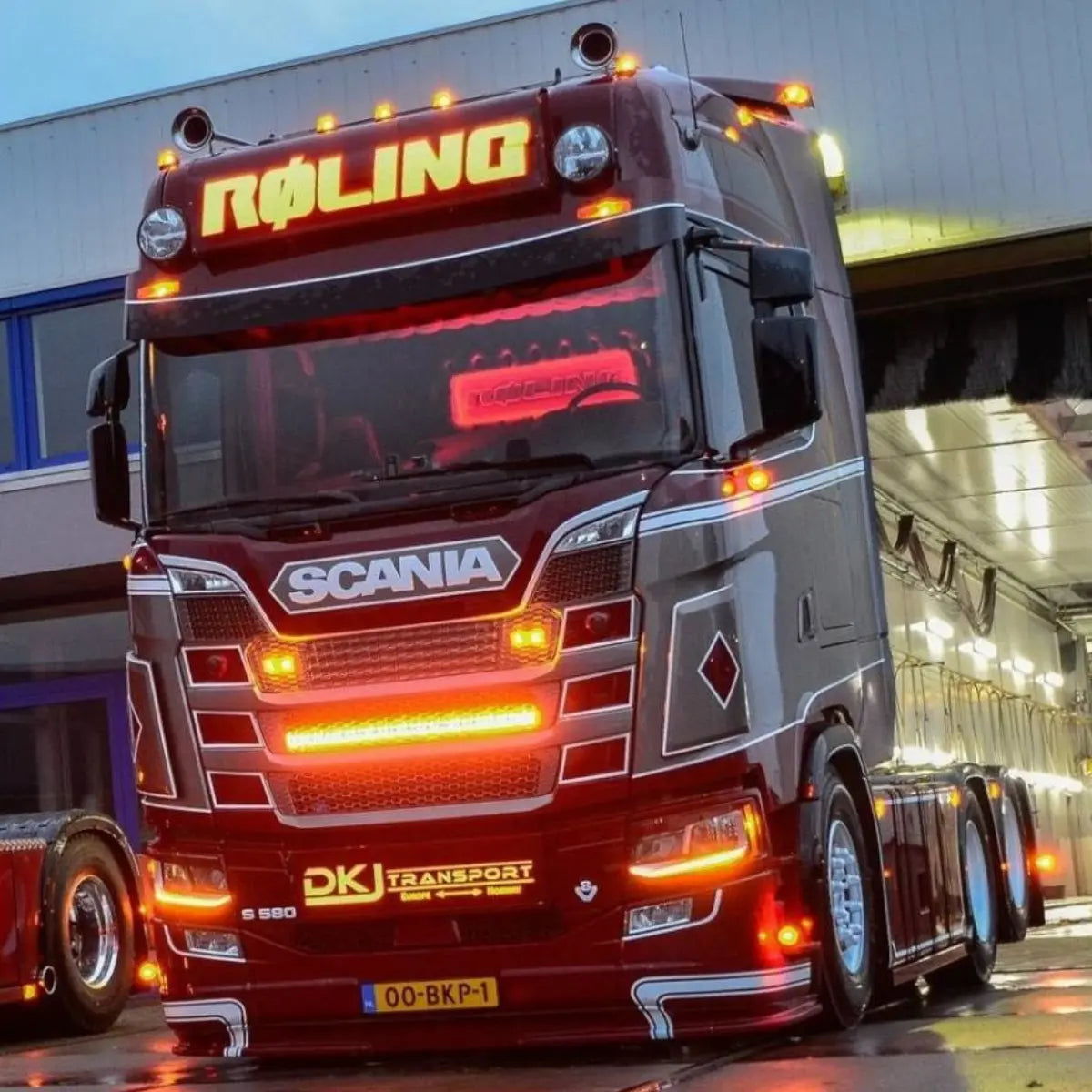 DRL Conversion Kit - Next Gen Scania S, R (Amber | 2016+) showcased on a Scania S 580 tractor unit with custom red-grey paint and LED marker lights.
