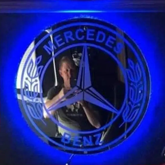 Mercedes Benz Truck LED Mirror/Light Board with glowing blue emblem, featuring a circular design, perfect for enhancing truck interiors with customizable RGB lighting.