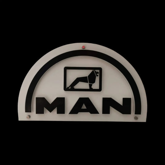 MAN 3D Truck Light Board featuring a semi-circular back-lit sign with MAN logo, stylized lion, in laminated wood and plexiglass for vehicle interiors.