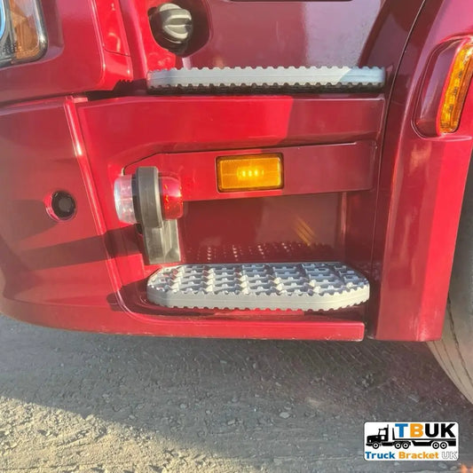 Next Gen R/S Series Step Infill Panel with Side Marker Light for Scania, featuring serrated aluminum step, amber and red lamps, TBUK logo visible.