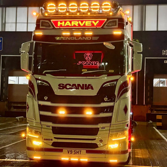 Scania 660 S tractor unit showcasing the Scania Infill Panel LED Truck Light Board by TLD, enhancing night visibility with illuminated features.