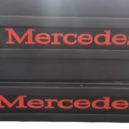 Mercedes MP4/5 Truck LED Seat Bases, featuring two black rectangular scuff-plates with red “Mercede” lettering, highlighting customizable, durable ECO Leather construction.