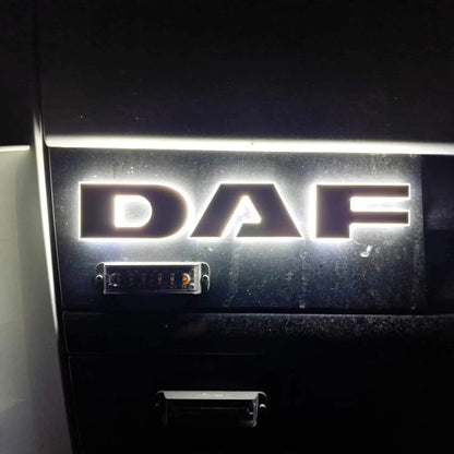 Close-up of the illuminated DAF Euro 5 LED Name Badge on a truck grille, showcasing its bright, back-lit design in acrylic and aluminum.