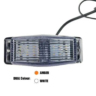 DTS LED Double Burner with attached power cable, dual-color amber or white module, featuring a polycarbonate lens for vehicle and industrial equipment use.