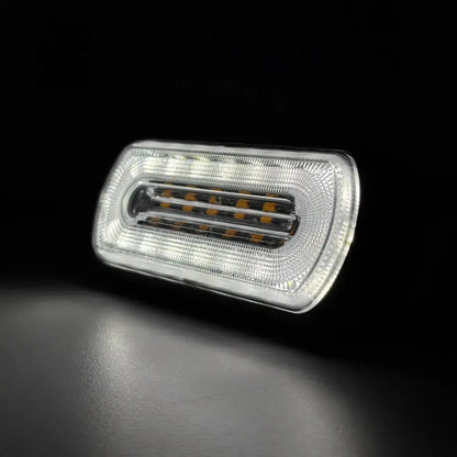 Amber HALO Strobe Warning Lamp R65 with a clear lens, featuring high-intensity white and amber LEDs for vehicle visibility and safety, suitable for 12/24v systems.