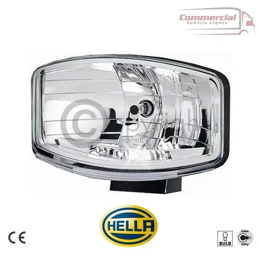 HELLA Jumbo 320 FF Spotlight with a clear lens, chrome reflector, and black plastic casing, designed for commercial vehicles. CE approved, shockproof, and waterproof.