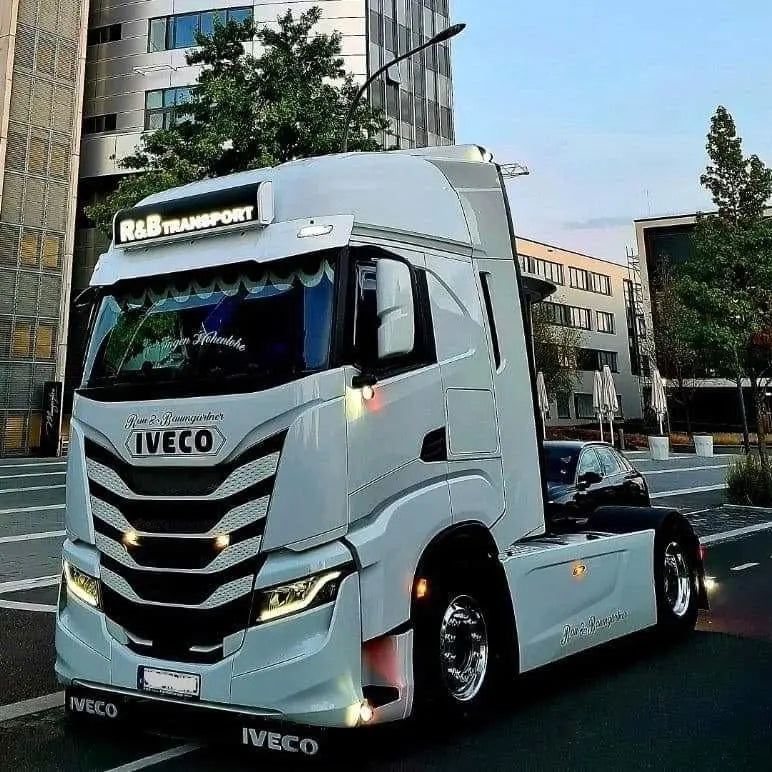 IVECO truck with “R&B Transport” branding on city street, showcasing 105x30x15cm Dutch Style Illuminated LED Headboard with white LEDs, visible above windshield.