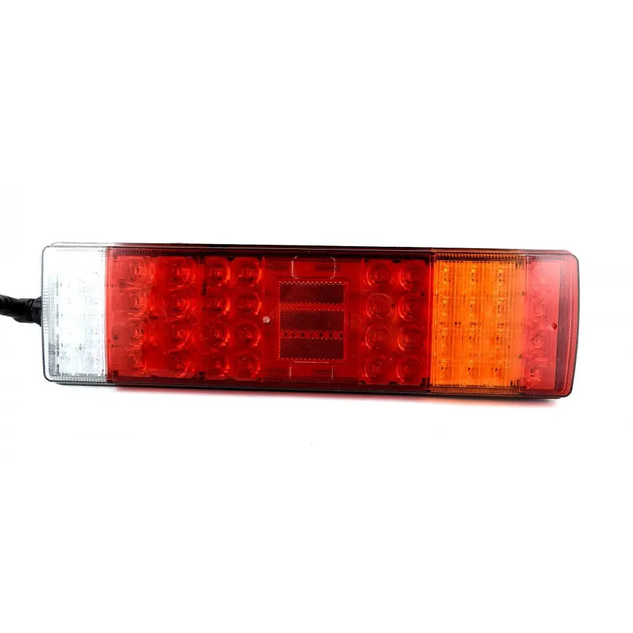 7 Function LED Combination Lamp Din Side Connector, featuring a clear, red, and amber multi-section housing for reverse, brake, and turn signals, suitable for 12V/24V vehicles.