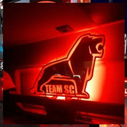 MAN Interior Truck Mirror featuring a glowing red, back-lit roaring lion sign with TEAM SCL, offering RGB lighting and remote control for custom truck styling.