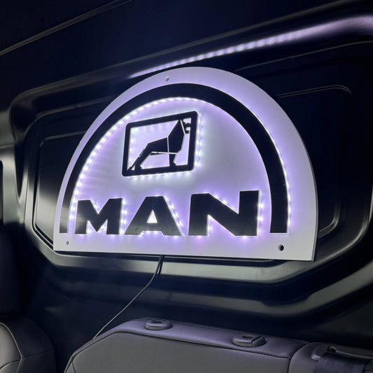 MAN 3D Van Light Board featuring a glowing MAN logo with LED lights, mounted on a truck interior, showcasing a sleek, illuminated design.