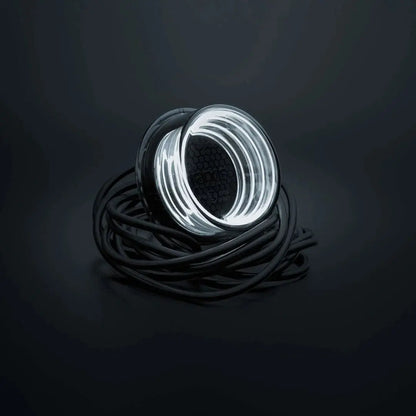 Strands FOR9T Geo Outline Marker Lights, featuring a circular LED ring-light design with concentric illuminated rings, attached to a long black cable coiled beneath.