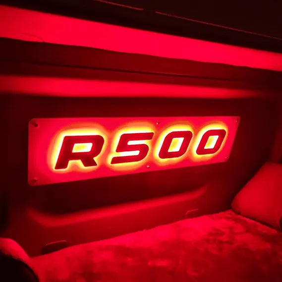 Scania R/S Series Truck Light Board, a custom red-backlit sign, mounted in a vehicle cabin, enhancing interior with strong, stylish illumination.