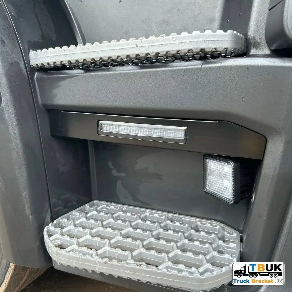 Next Gen Step Infill Light Bars for Scania trucks, featuring serrated metal foot-plates, LED lights, and durable stainless steel construction for enhanced visibility and seamless integration.