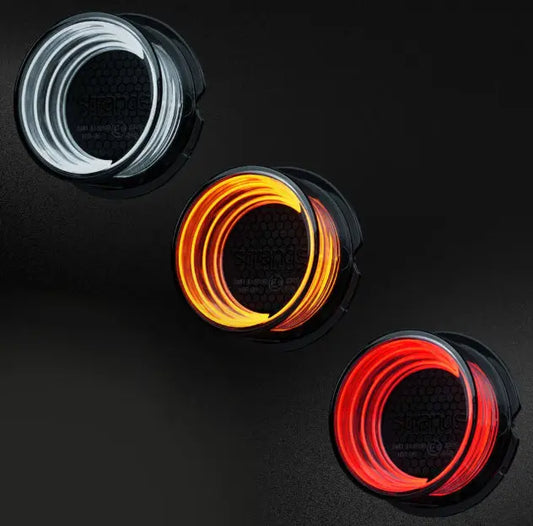 Strands FOR9T Geo Outline Marker Lights: three spools of glowing, flexible wire for decorative outlining, featuring distinct coiled designs on each spool.