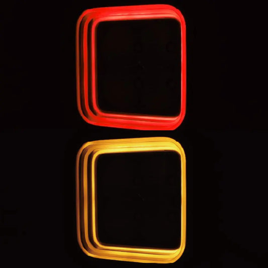 Boreman Cube Work Lamp 1001-1510 displaying red and amber 'Tunnel Effect' lights, with glowing square frames on a black background, showcasing its futuristic design.