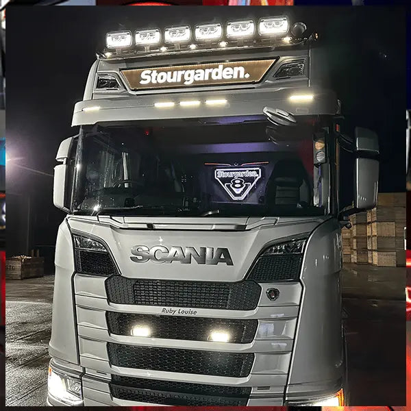 Valhalla Viking 50cm 3D Lightboard displayed in a Scania truck, showcasing its illuminated V8 logo on the dashboard, enhancing the cabin's stylish appearance.