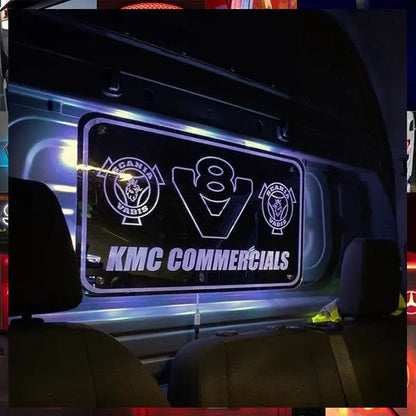 Inside a truck cab, a sign with Scania logos and V8 emblem is accented by purple/green lighting, showcasing the Mercedes Sprinter Interior LED Mirror 600x330mm.