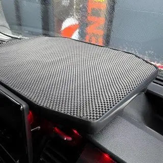 FORD TRANSIT LED Dash Table (2018-23) featuring a black, honeycomb-textured, non-slip mat on the dashboard, includes LED window, remote control, and Velcro fastening.