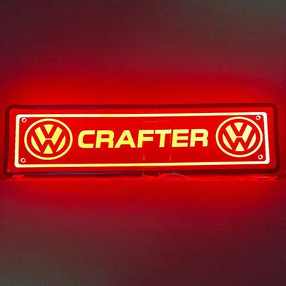 Illuminated VW Crafter Plexi Glass Light Board featuring two VW logos and CRAFTER text, designed for truck cabins with RGB lighting and remote control.