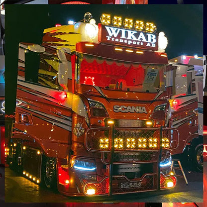 Late-model Scania truck showcasing the 105x30x15cm Standard Dutch Style Illuminated LED Headboard (White LED) with bold customization and auxiliary driving lights.