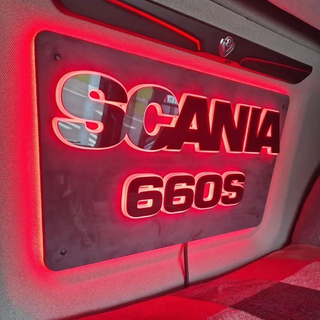Scania Infill Panel LED Truck Light Board by TLD 24 Volt, edge-lit in red, mounted inside a Scania truck cab, highlighting Scania 660S with griffin logo above.