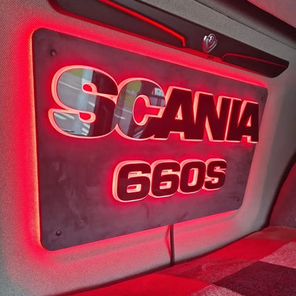 Scania Infill Panel LED Truck Light Board by TLD 24 Volt, edge-lit in red, mounted inside a Scania truck cab, highlighting Scania 660S with griffin logo above.
